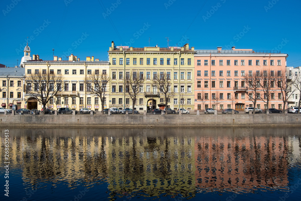 City river houses in Saint Petersburg, Russia. Fontanka river in Saint Petersburg, Russia.