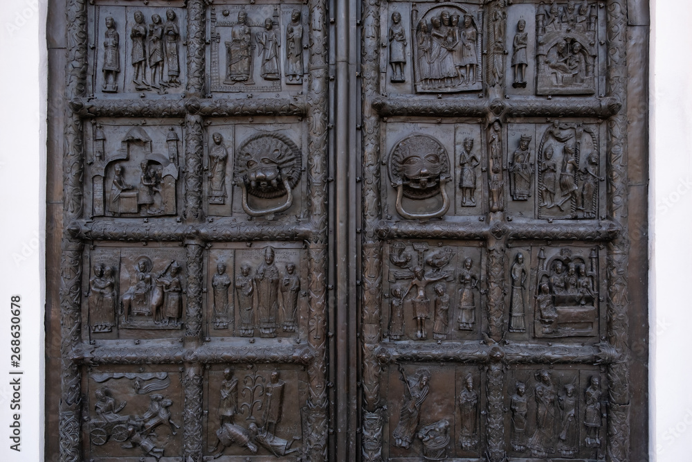 Close-up of theancient bronze Magdeburg Gates (1153) of Saint Sophia Cathedral in Veliky Novgorod