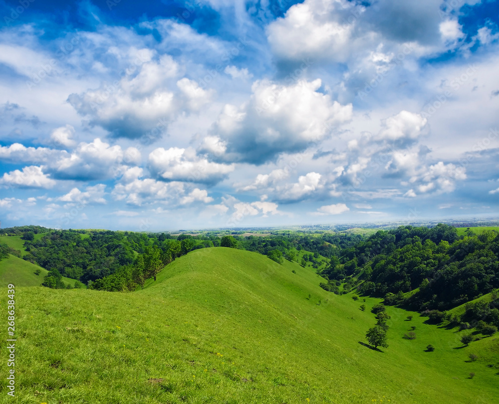 green hills and beautiful sky