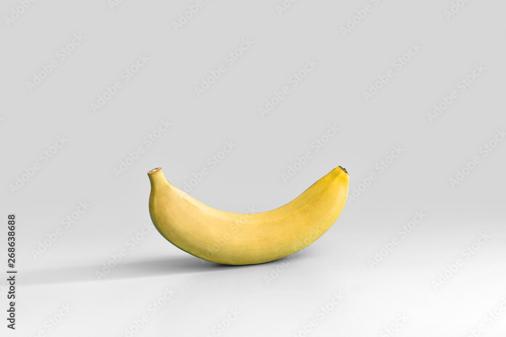 Juicy ripe yellow banana on a white background. Juicy ripe yellow banana on a white background.