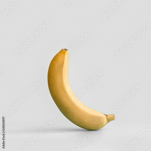 Juicy ripe yellow banana on a white background.
