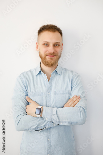 portrait of a young caucasian man in an apartment © Alexander