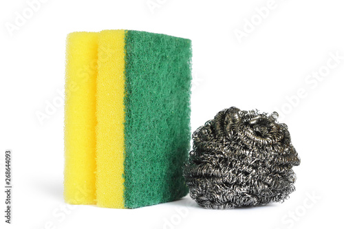 Stainless steel scrubber and kitchen sponge isolated on white