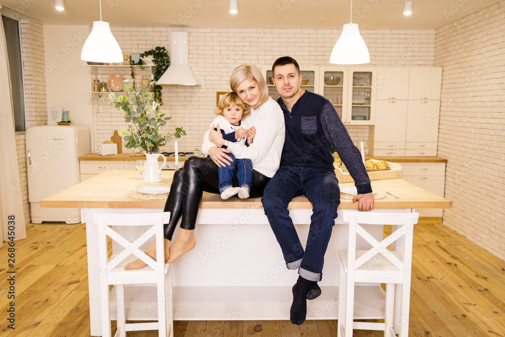 beautiful family dad mom and daughter have fun in a apartment beautiful family dad mom and daughter have fun in a apartment
