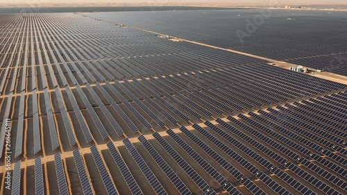 AERIAL. Drone close up view of solar power panels, in desert.