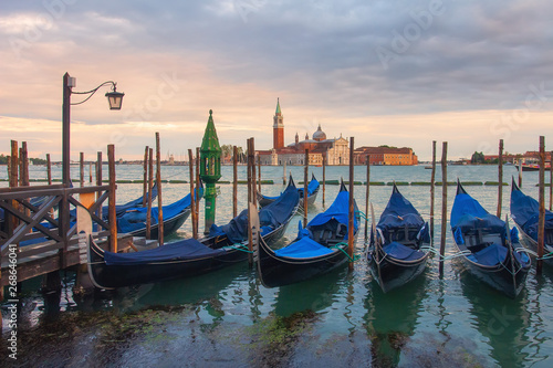 Gondolas in Venice view on San Giorgio Maggiore church from San Marco square in Italy © dzmitrock87