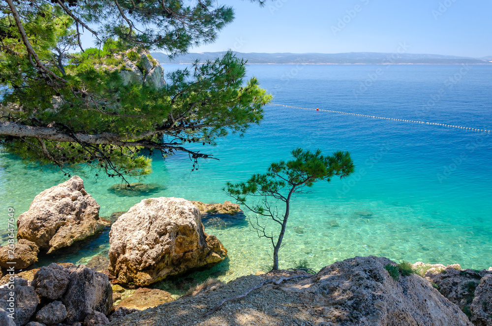 crystal clear water of Adriatic sea in Brela on Makarska riviera, Dalmatia, Croatia crystal clear water of Adriatic sea in Brela on Makarska riviera, Dalmatia, Croatia