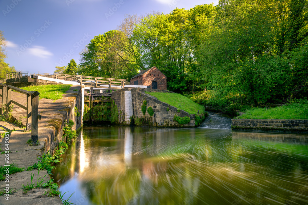 Fototapeta premium Bingley Five Rise Locks on the Leeds and Liverpool canal raise the waterway 60 feet. They were built in 1774.