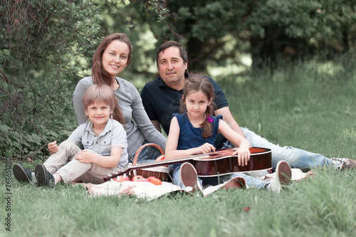 portrait of happy family on picnic Sunday