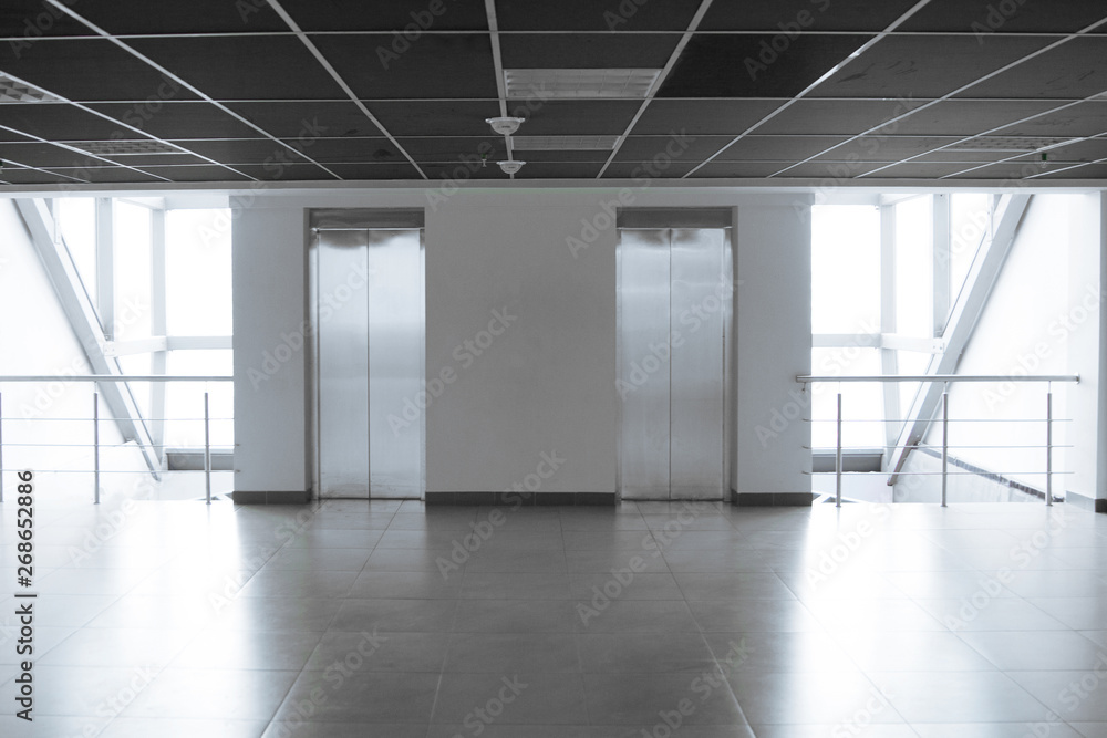 Fototapeta empty spacious corridor in a modern office building