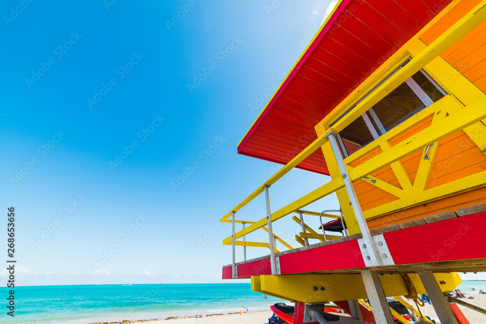 Orange, red and yellow lifeguard tower in Miami Beach Orange, red and yellow lifeguard tower in Miami Beach