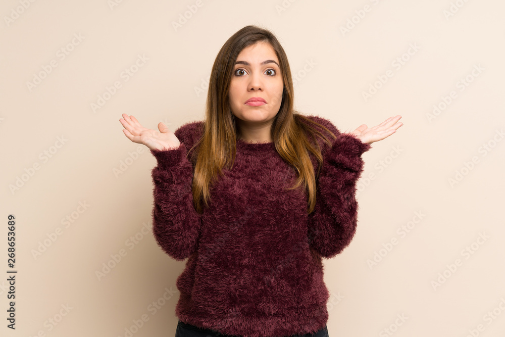 Young girl making doubts gesture Young girl making doubts gesture