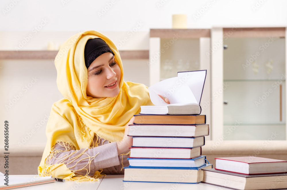 Female student in hijab preparing for exams Female student in hijab preparing for exams