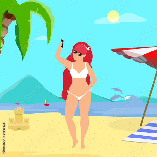 Young Ginger Woman Making Selfie on Sandy Beach.