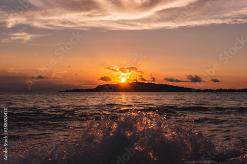 Sunset at the sea, dramatic sky, indonesia