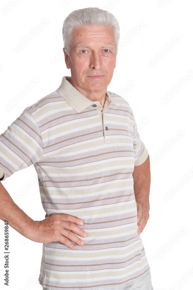 Portrait of senior man holding hands on hips Portrait of senior man holding hands on hips