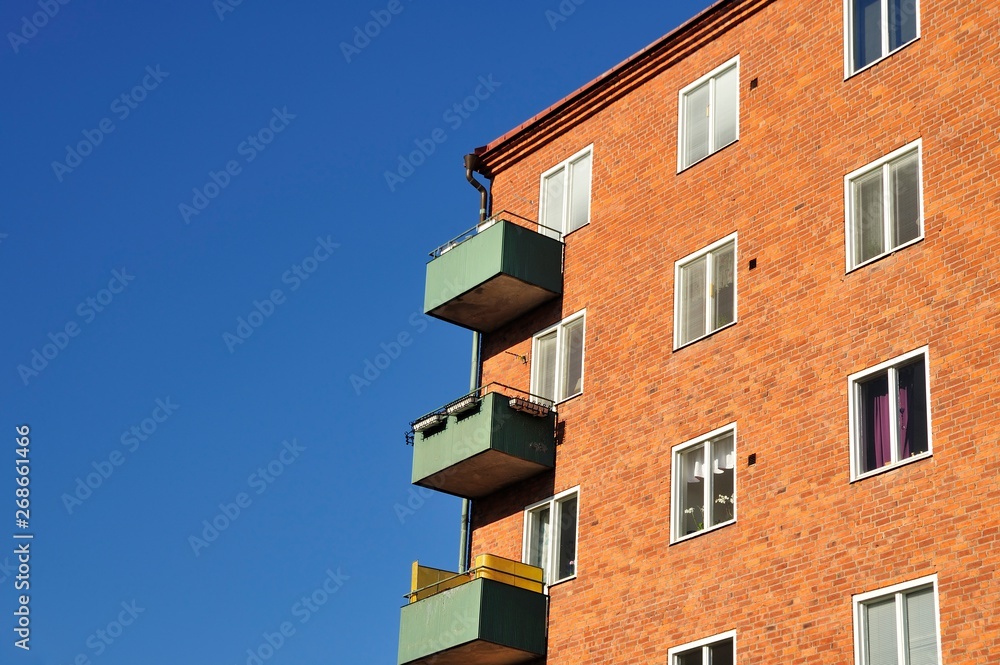 House / apartment building with balconies, blue sky House / apartment building with balconies, blue sky