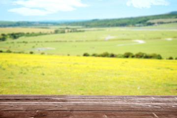 Foto auf Acrylglas Gelb wood deck overlooking farm landscape  © Michael Gray