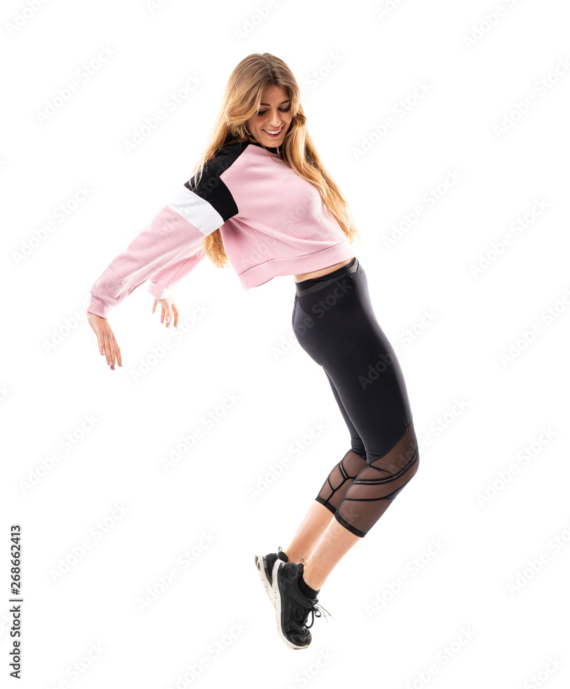 Urban Ballerina dancing over isolated white background Urban Ballerina dancing over isolated white background