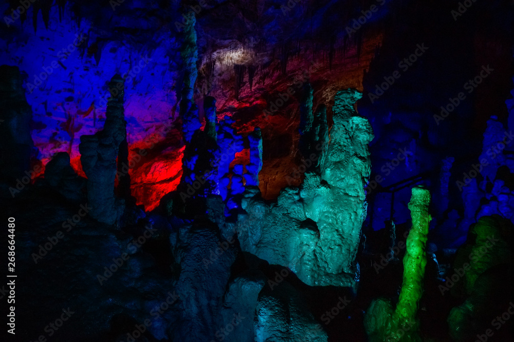 blue and green illuminated Prometheus Cave