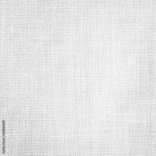 Hessian sackcloth woven texture pattern background in white grey color