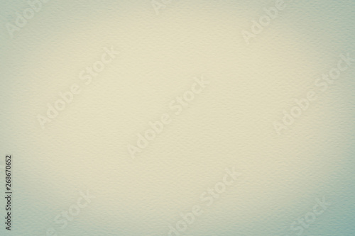 Water color paper textured background in light cyan turquoise blue green.