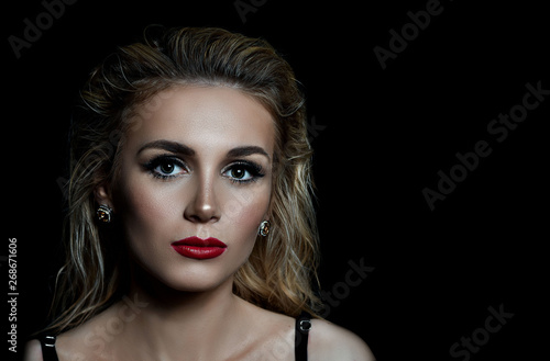 Wallpaper Mural the sexy strict woman with makeup and a fashionable hairstyle poses in studio on black background Torontodigital.ca