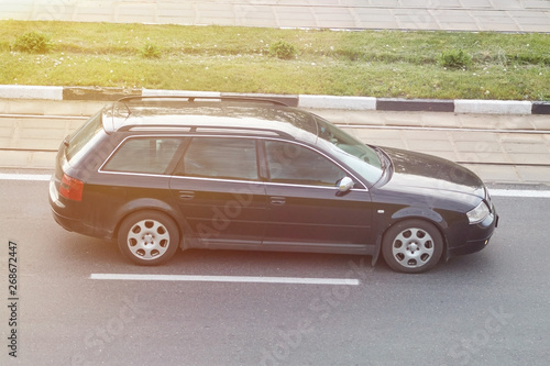 Passenger car black in the city