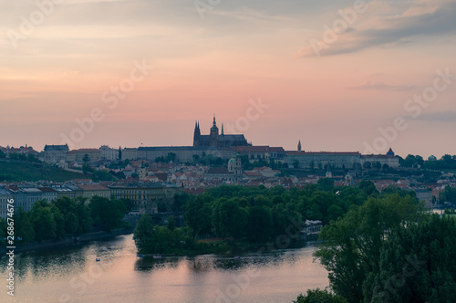 Historic Prague castle and Vltava river view on sunset