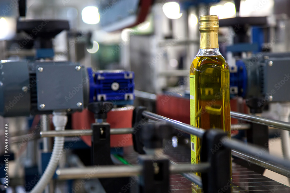Bottles on Conveyor Belt in Factory 
