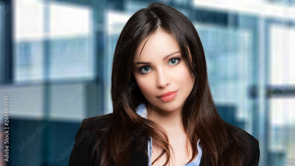 Beautiful businesswoman portrait in her office Beautiful businesswoman portrait in her office