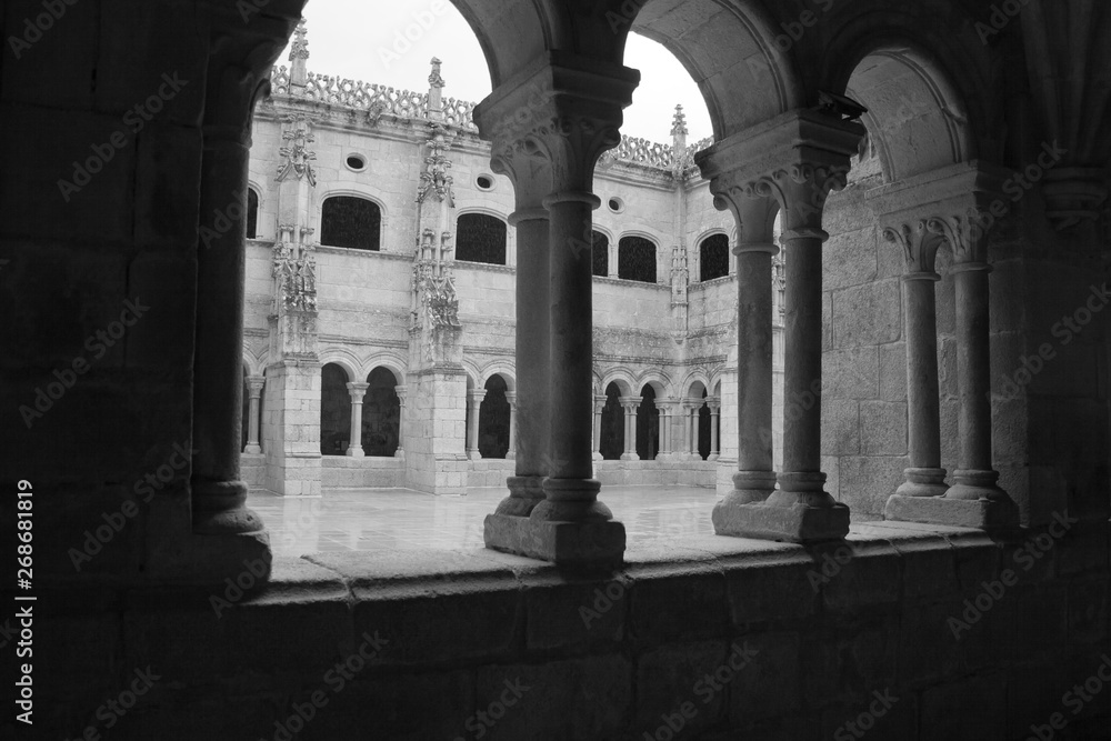 Santo Estevo, Spain - April 17, 2019: Plateresque style cloister belonging to a convent qualified as a national hostel. Black and write image.
