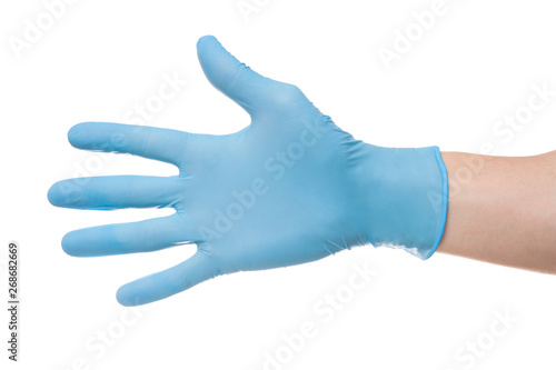Right hand wearing latex surgical glove with gesture number five on wite background.