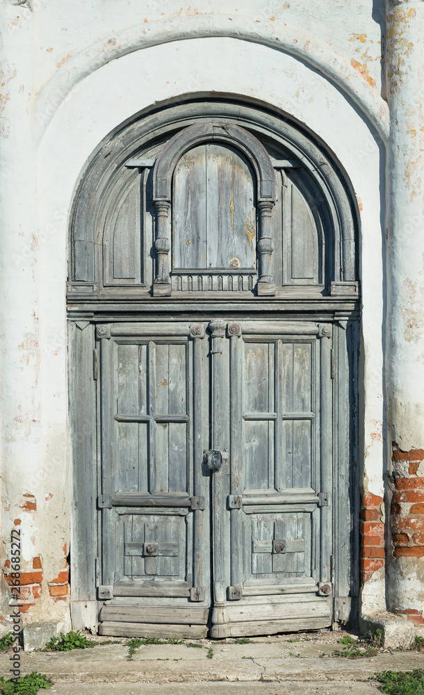 The doors of an old abandoned church. Suzdal, Vladimir Region, Russia.