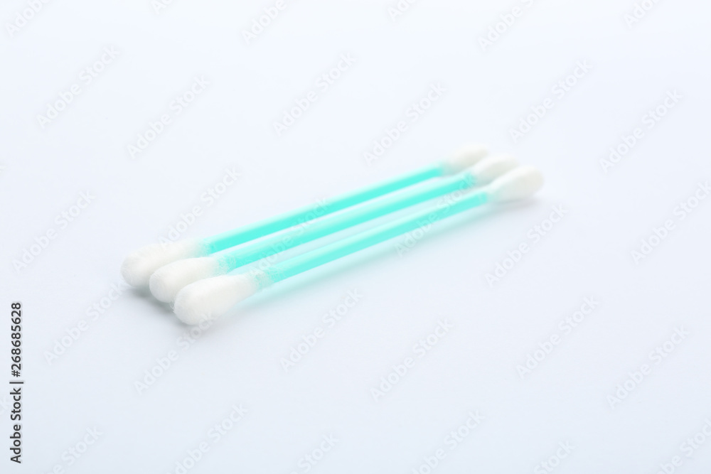 Plastic cotton swabs on white background. Hygienic accessory Plastic cotton swabs on white background. Hygienic accessory