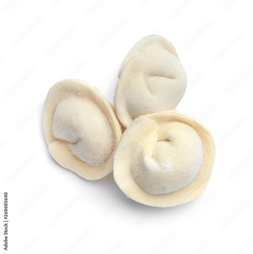 Frozen raw dumplings on white background, top view Frozen raw dumplings on white background, top view