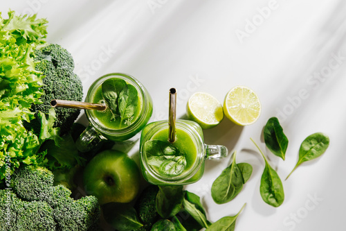 Healthy breakfast with green smoothie. Detox and diet  concept. Vegetarian food. photo