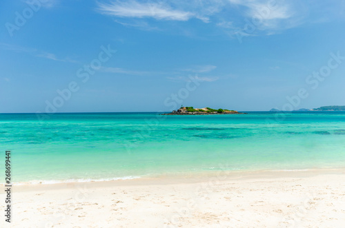 beautiful island the beach like paradise and blue aqua sea water summer background in Thailand. © thithawat