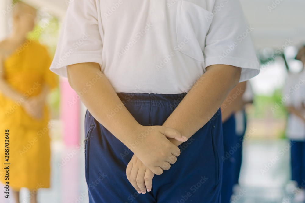 Group of students try to meditate for the peace of mind by walk with Buddhist monk in school. Group of students try to meditate for the peace of mind by walk with Buddhist monk in school.