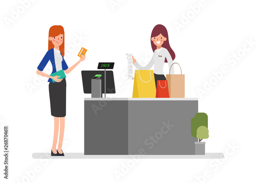 Cashier accepting payment for purchase with a card. Customer service operation.