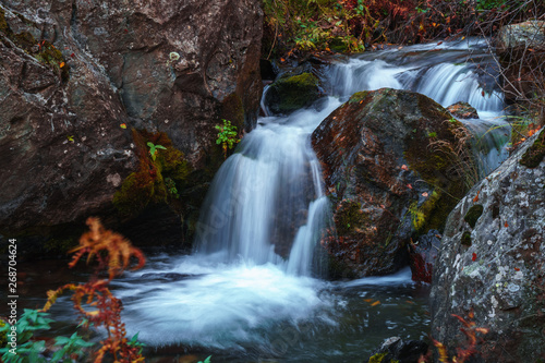 Scenic waterfall view in Dariali gorge in autumn, Gveleti waterfall, Georgia