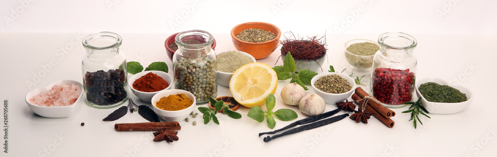 Spices and herbs on table. Food and cuisine ingredients with basil Spices and herbs on table. Food and cuisine ingredients with basil
