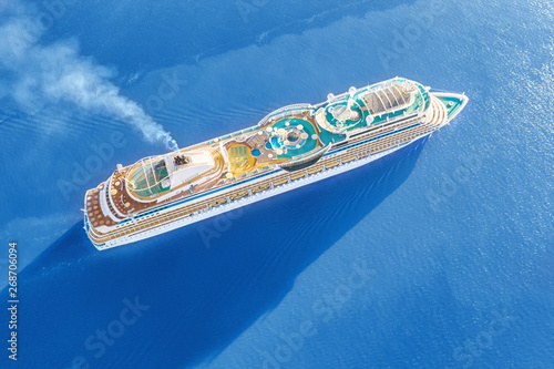 Luxury cruise ship sailing across the sea aerial view © eshma