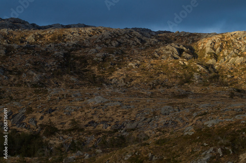 Mountain Ridge with dramatic clouds and skies and sun beams