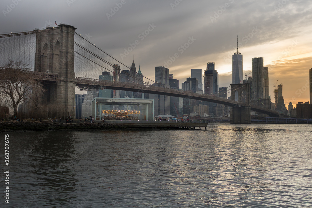 Brooklyn Bridge at night view from Brooklyn neighborhood, Manhattan, New York.