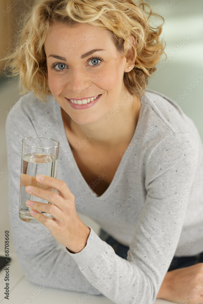 happy young woman drinking water happy young woman drinking water