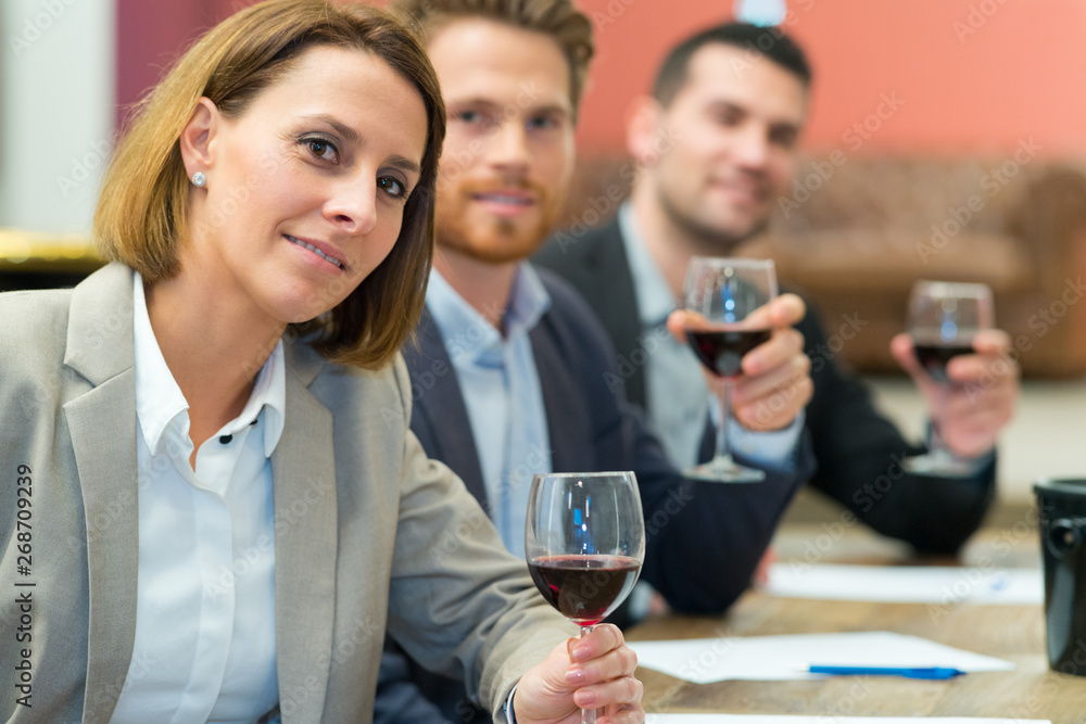 business people with glasses of wine together business people with glasses of wine together