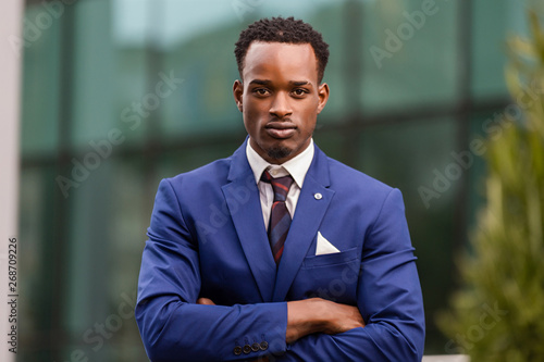 Outdoor standing portrait of a black African American business man