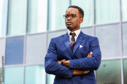 Outdoor standing portrait of a black African American business man