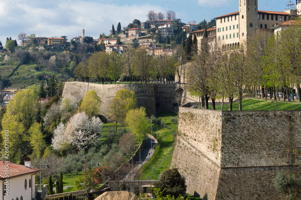Detail of the ancient city walls of Bergamo the Upper town, these urban public places have been recently nominated Unesco heritage site
